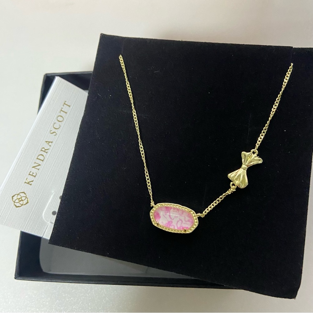 Kendra Scott Gold Necklace with Pink Marbled Pendant and Bow Charm - Picture 4 of 5